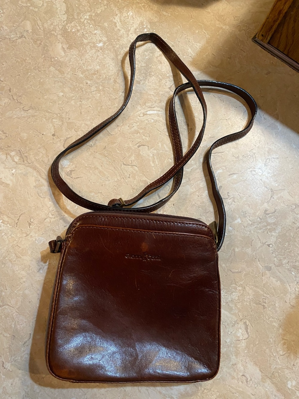 Compact Dark Brown Leather Crossbody Bag with Adjustable Strap